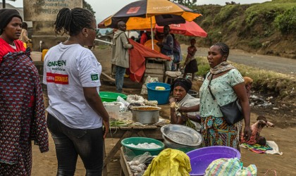 Women at a food stall in DRC