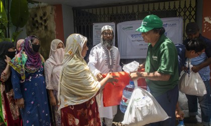 Concern Emergency response team member distributes emergency relief packages