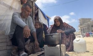 Hassan* (48) and Mariam* (34) are married with five children and living in a refugee tent in Rafah, struggling with hunger and relying on canned food or informal donations. (Photo: Concern Worldwide)