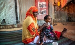 Calaso* (37) is a mother of five children. Calaso and her family moved to the refugee camp due to recurring droughts. She brought her child to the MCH (Maternal &amp; Baby Health Center) in Siinkadheer after her child became malnourished. (Photo: Mustafa Saeed/Concern Worldwide)