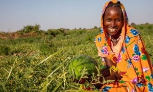 Mahadia Gamar (24) showcases her watermelon at her farm in Karo village, Chad. (Photo: Eugene Ikua/Concern Worldwide)