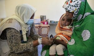 Mona Salh with her son, Faiza Abdullah (3) at Um Shalaya health centre in Central Darfur, Sudan. 