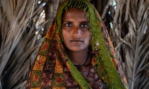 Shatro (26) standing inside her shelter in the village of Waghreji, MirpurKhas. Photo: Arif Shad/Ingenious Captures/Concern Worldwide