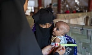 Ismat Ara* (42) visits a Concern nutrition centre with her malnourished child Ashmita* (9 months)