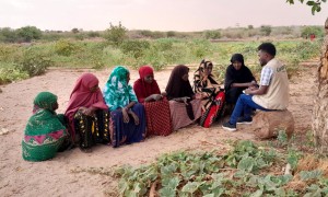 Concern team with a women's permagarden group discussing the impact of Hanaano project and expected results. Photo: Abdinasir Hassan/ Lifeline Gedo.