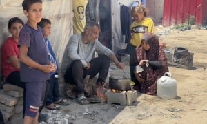 Hassan* (48) and Mariam* (34) are married with seven children. They are struggling with hunger and living in a refugee tent in Rafah. (Photo: Concern Worldwide)
