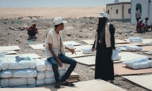 Concern team distribute shelter materials to people affected by the sandstorm that struck Yemen's Al Anad IDP Camp. Photo: Ammar Khalaf/Concern Worldwide
