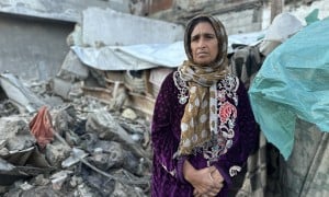 Manila* and her family were displaced to Rafah then to Al-Nuseirat. They are suffering from hunger and thirst. They have no tents, food or water. "Life is harsh and full of suffering". Photo: Khalil Adwan
