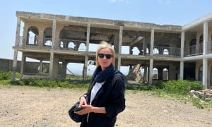 Journalist Orla Guerin standing outside an abandoned building in Taiz, Yemen