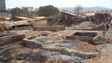 The remains of a slum on Sierra Leone following a fire.