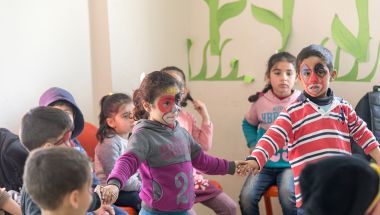 Zilan and her friends learn by playing together at one of the community Centres in Sanliurfa province.