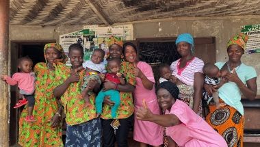 Mothers and nurses at a Peripheral Health Clinic in Magabana Community, Sierra Leone