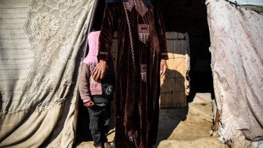 Amira* with her daughter outside of the tent where they live in Syria Photo: Gavin Douglas/Concern Worldwide *Name has been changed