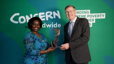 Dr Salome Mbugua receiving her Women of Concern 2024 honouree award from David Regan, Concern CEO