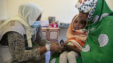 Mona Salh with her son, Faiza Abdullah (3) at Um Shalaya health centre in Central Darfur, Sudan. 