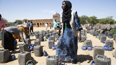 A distribution of hygiene kits at Banjdeed, West Darfur, Sudan, targetting vulnerable households in 10 of the surrounding villages. This area was badly affected by the conflict that broke out in Sudan in April 2023 and many people fled across the border to Chad, leaving everything behind. Some of them have since returned to find their homes damaged or destroyed and their possessions looted. 