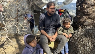 A man and his children in Gaza