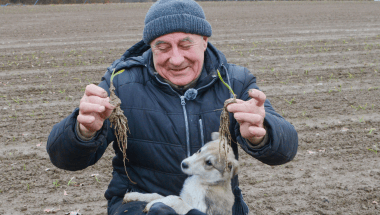 Ivan Zakharenko shows off his young garlic roots