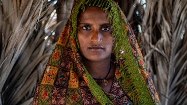 Shatro (26) standing inside her shelter in the village of Waghreji, MirpurKhas. Photo: Arif Shad/Ingenious Captures/Concern Worldwide