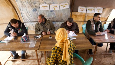 Members of the Syria Relief team deliver the cash vouchers to people affected by the February 2023 earthquake. (Photo: Ali Haj Suleiman/DEC/Fairpicture)