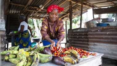 Favor B Tarr, with some of the produce from her vegetable farm at Kaytor Town, Grand Bassa, Liberia. The community is being supported by Concern in an integrated programme called IFANCI, funded by the LDSCC. (Photo: Kieran McConville/Concern Worldwide)