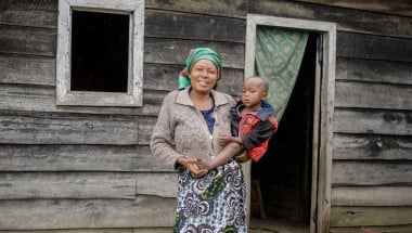 Mutesi Mururugwerwa is back in her home village after spending several months with her young children in a camp for displaced people Photo: Samuel Isenge/Concern Worldwide