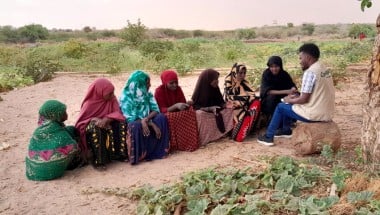 Concern team with a women's permagarden group discussing the impact of Hanaano project and expected results. Photo: Abdinasir Hassan/ Lifeline Gedo.