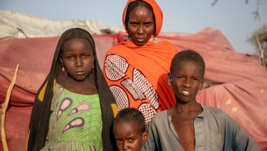 Lana with three of her eight children. From Left: Umi (9), Abdul (5) and Mohammed (7) at their shelter in Lac Province in Western Chad. Photo: Eugene Ikua/Concern Worldwide