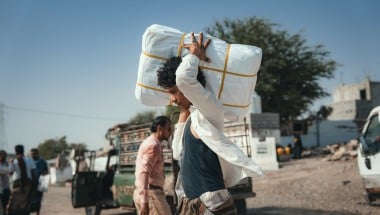 The Concern team distributing shelter materials to people affected by the sandstorm that struck Al Anad IDP Camp, Tuban District, Yemen.