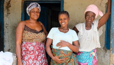 Pregnant mum Safinatu Kamara (22) with her aunt and grandmother at the family home in Mambolo. The health centre that Safinatu is attending for her pregnancy is supported by Concern. Photo: Darren Vaughan/Concern Worldwide