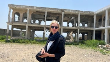 Journalist Orla Guerin standing outside an abandoned building in Taiz, Yemen