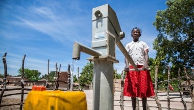 15 year old Liliana Mwenza wa llunga says the new water point and other interventions by the Concern-led WASH consortium in her village, Mulombwa, has had a very positive impact on family life. Photo: Kieran McConville/ Concern Worldwide.