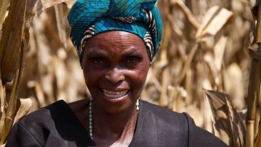 Doris Malinga showing her plot of land which she farmed using the conservation agriculture method, Kabudula, Lilongwe District, Malawi. Photo: Jennifer O&#039;Gorman/ Concern Worldwide.