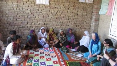 Brid Kennedy talking with VDMC members of the village Daman Shah UC Thull Nao, District Jacobabad. Photo: Concern Worldwide. 