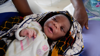 A newborn baby boy at the Community Care Center in John Logan Town, Grand Bassa, Liberia built by Concern Worldwide. Photo taken by Kieran McConville, 2015.