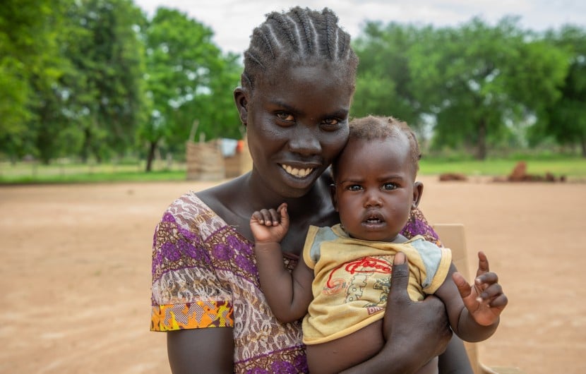 Adut with her daughter Axlam (nine months) at the Lueth Ngor PHCU (Public Health Care Unit) in Aweil North. Photo: Eugene Ikua/Concern Worldwide