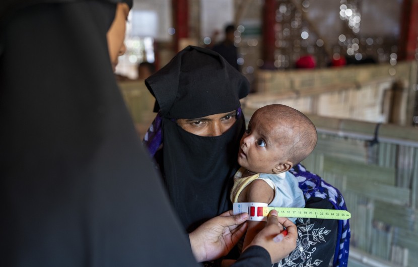 Ismat Ara* (42) visits a Concern nutrition centre with her malnourished child Ashmita* (9 months)