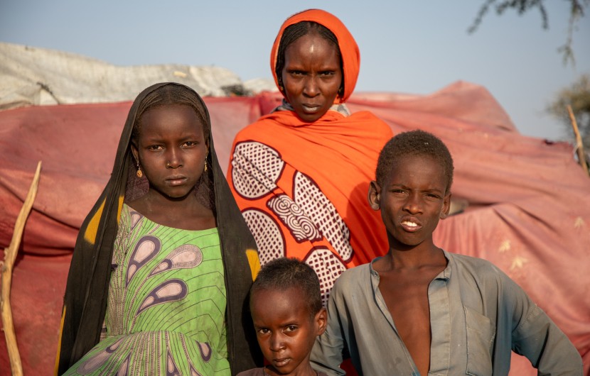 Lana with three of her eight children. From Left: Umi (9), Abdul (5) and Mohammed (7) at their shelter in Lac Province in Western Chad. Photo: Eugene Ikua/Concern Worldwide