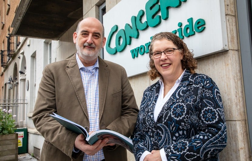 Concern Worldwide Chief Executive Officer Dominic Crowley and Chair Rosalyn Tamming with the 2025 Annual Report. Photo: Jon Hozier-Byrne/Concern Worldwide