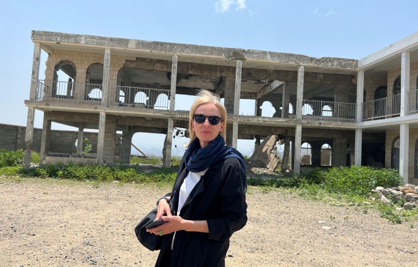 Journalist Orla Guerin standing outside an abandoned building in Taiz, Yemen