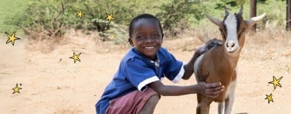 A young boy with a goat