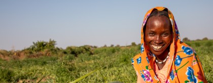 Mahadia Gamar (24) showcases her watermelon at her farm in Karo village