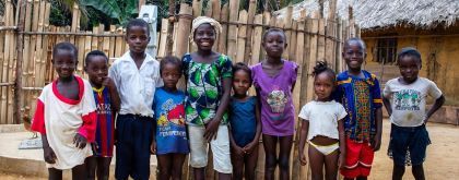 Children of Ceayah Town beside their new well, which has been installed through the Concern WASH programme in Liberia. Photo: Gavin Douglas/Concern Worldwide.