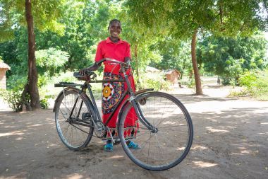 Fatinesi’s bike helps her so much with her farming business in Malawi.