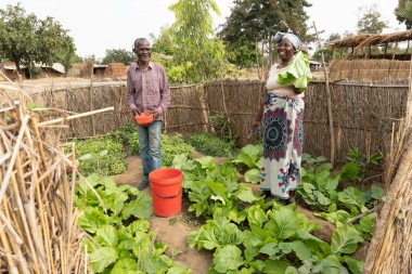 Josephine Kazembe (63) and her husband Andalasani in their home garden