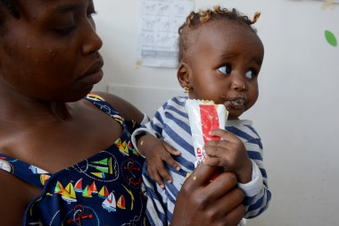 Mary Wambui Wangechi (28) with her daughter Adina