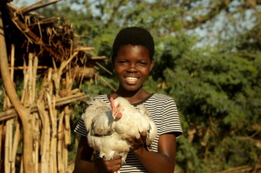 Sarah Mithapa (16) holds a chicken