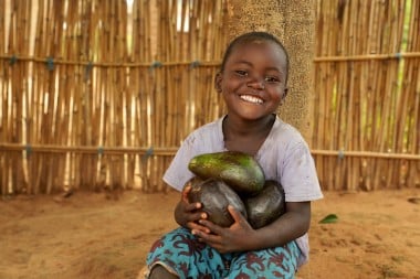 Steven Alexander (3) holds avocados