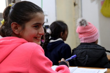A young girl in school in Syria