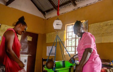Marie Christina Kargpo with baby Francis at Bundulai Maternal and Child Health Post